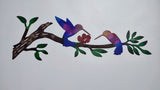 Humming birds on a branch