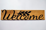 Welcome sign on wood